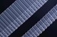 Zazdrostka z jednopasowym wzorem zawijasów haftowanym na połyskującej markizecie
